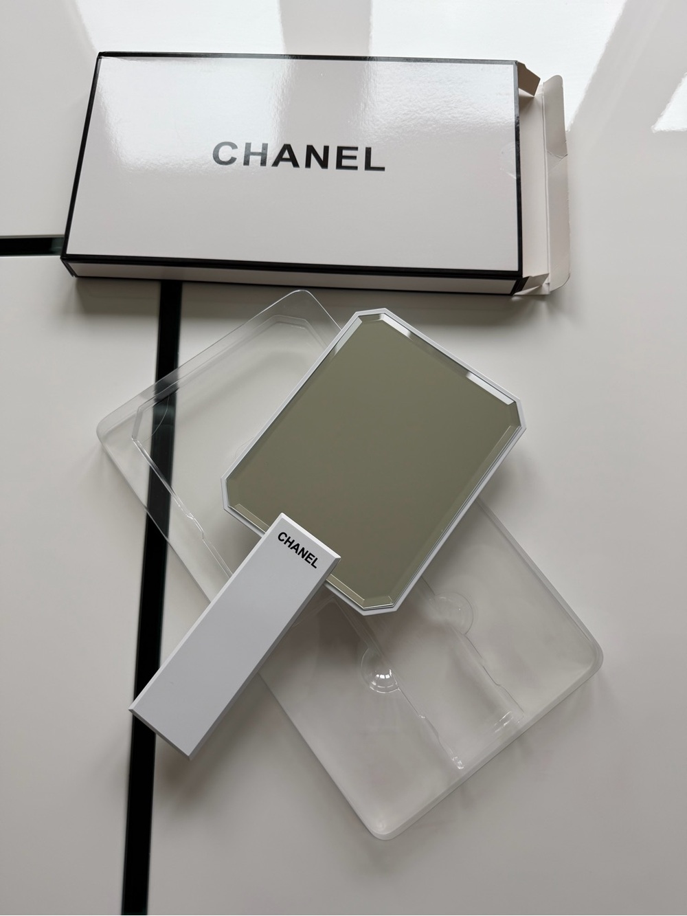 CHANEL White Handheld Mirror with Black Logo